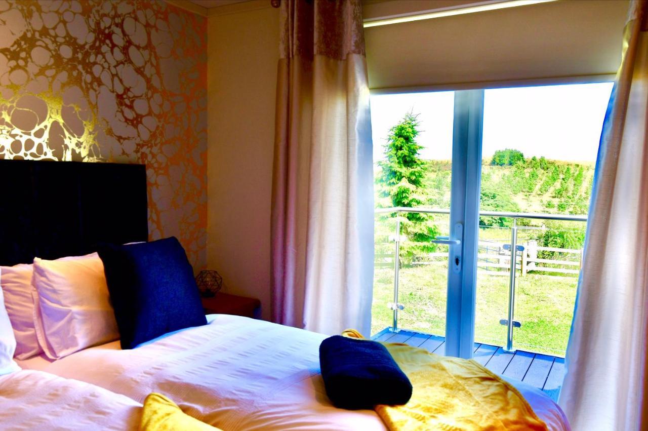 Arbennig Luxury Lodges Mold Exterior photo